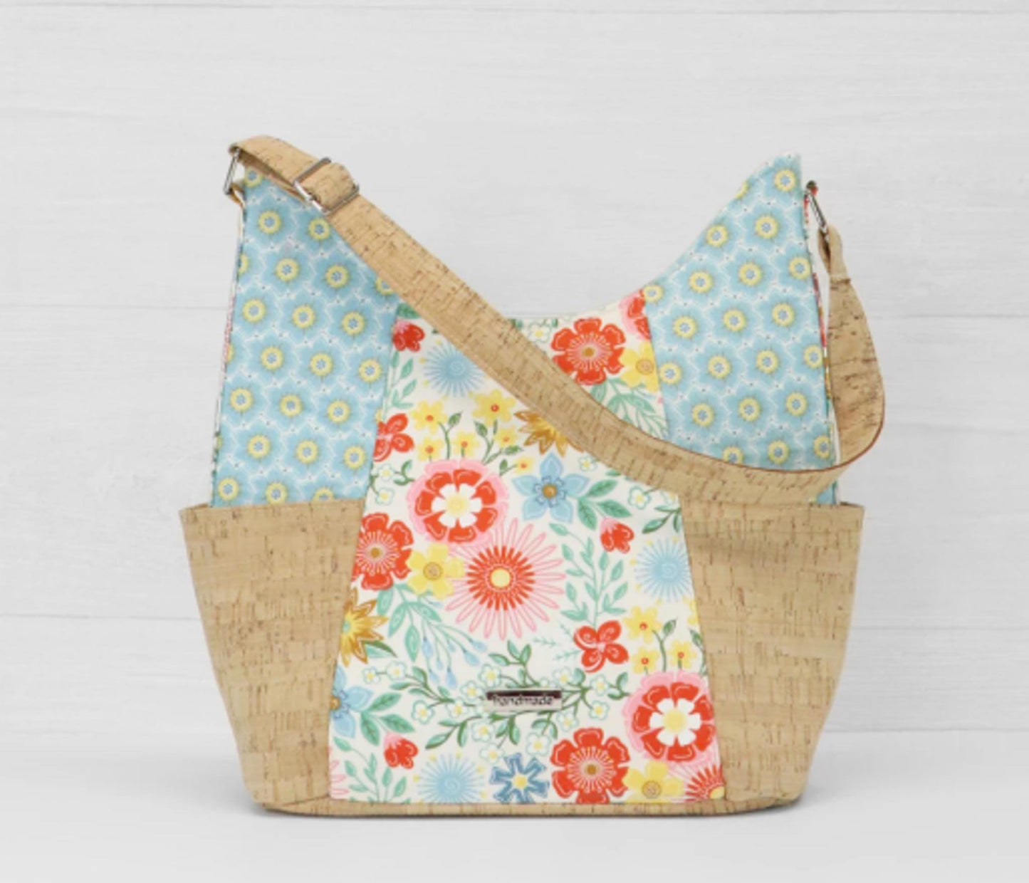 Emma Bag Pattern by Sallie Tomato - Finished size is 10 1/4" wide, 12-1/2" high, and 5" deep.