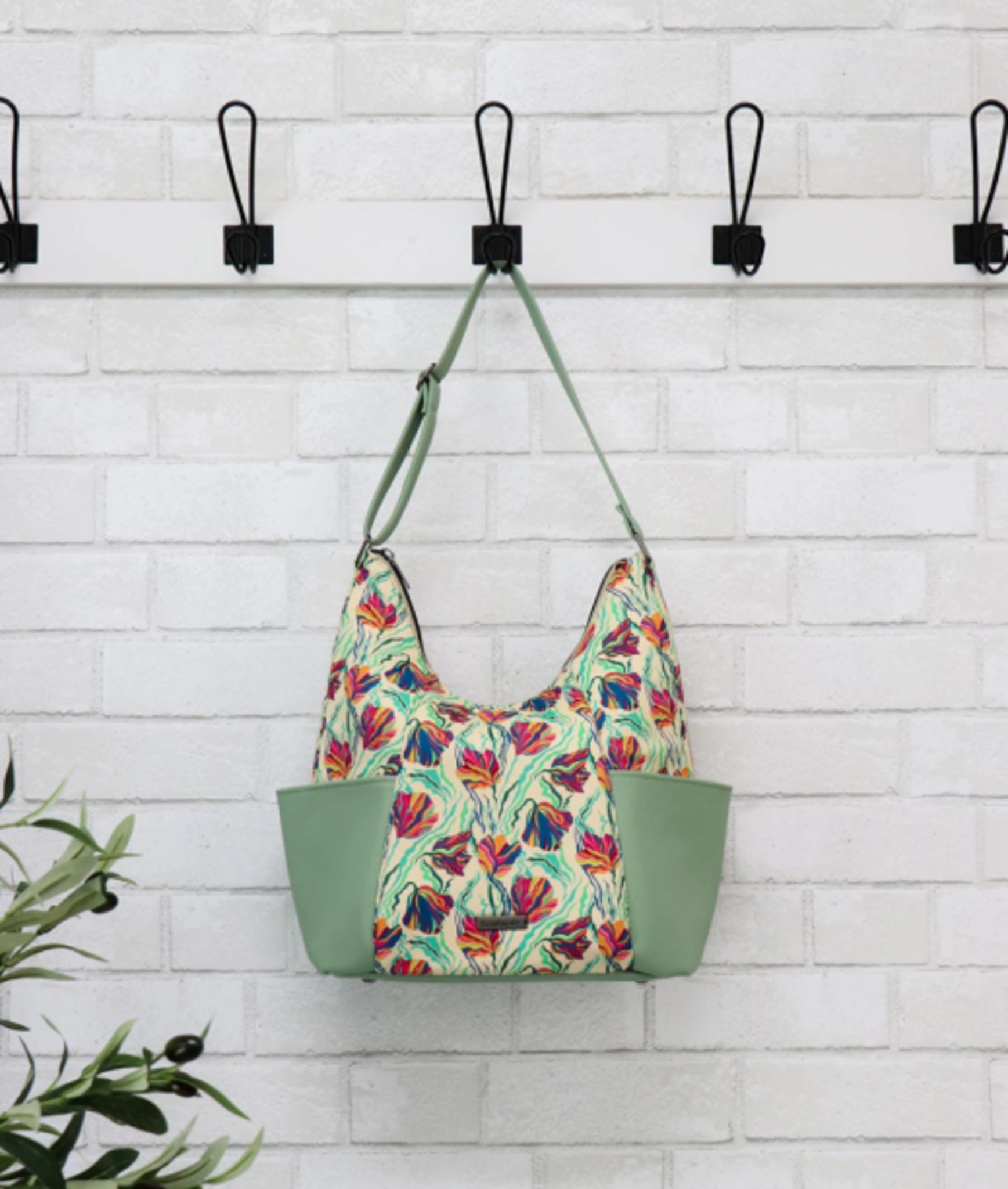 Emma Bag Pattern by Sallie Tomato - Finished size is 10 1/4" wide, 12-1/2" high, and 5" deep.